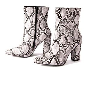 Brand new snake print booties, never worn